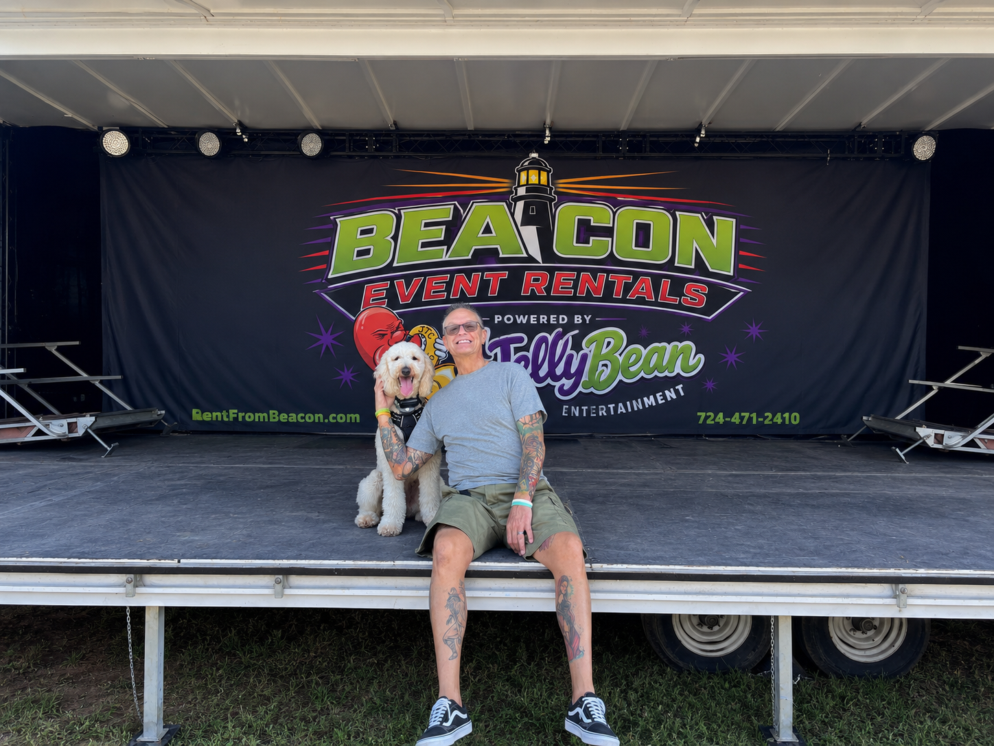 Billy and Maverick sitting on a Beacon mobile stage